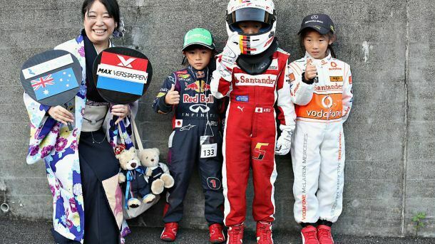 SUZUKA, JAPAN - OCTOBER 06: Fans supporting Red Bull Racing, Ferrari and McLaren during previews ahead of the Formula One Grand Prix of Japan at Suzuka Circuit on October 6, 2016 in Suzuka. (Photo by Mark Thompson/Getty Images)