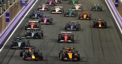 JEDDAH, SAUDI ARABIA - APRIL 20: Oscar Piastri of Australia driving the (81) McLaren MCL39 Mercedes leads Max Verstappen of the Netherlands driving the (1) Oracle Red Bull Racing RB21 George Russell of Great Britain driving the (63) Mercedes AMG Petronas F1 Team W16 and the rest of the field at the start during the F1 Grand Prix of Saudi Arabia at Jeddah Corniche Circuit on April 20, 2025 in Jeddah, Saudi Arabia. (Photo by Sam Bloxham/LAT Images)