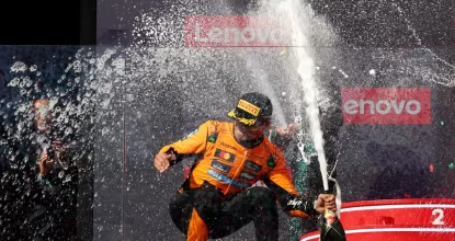 BUDAPEST, HUNGARY - AUGUST 03: Race winner Lando Norris of Great Britain and McLaren sprays the victory Champagne on the podium during the F1 Grand Prix of Hungary at Hungaroring on August 03, 2025 in Budapest, Hungary. (Photo by Clive Rose/Getty Images) *** BESTPIX ***