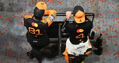 SINGAPORE, SINGAPORE - OCTOBER 05: Lando Norris of Great Britain and McLaren and Oscar Piastri of Australia and McLaren celebrate with their team after winning the Constructors Championship during the F1 Grand Prix of Singapore at Marina Bay Street Circuit on October 05, 2025 in Singapore, Singapore. (Photo by Sam Bagnall/Sutton Images)