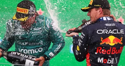 ZANDVOORT, NETHERLANDS - AUGUST 27: Race winner Max Verstappen of the Netherlands and Oracle Red Bull Racing and Second placed Fernando Alonso of Spain and Aston Martin F1 Team celebrate on the podium during the F1 Grand Prix of The Netherlands at Circuit Zandvoort on August 27, 2023 in Zandvoort, Netherlands. (Photo by Dean Mouhtaropoulos/Getty Images) // Getty Images / Red Bull Content Pool // SI202308270757 // Usage for editorial use only //