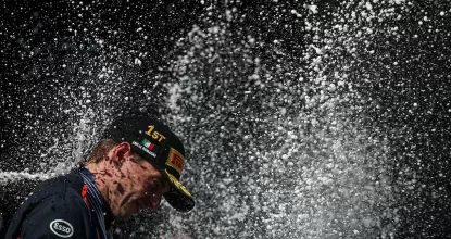 IMOLA, ITALY - MAY 18: Race winner Max Verstappen of the Netherlands and Oracle Red Bull Racing sprays the victory Champagne on the podium during the F1 Grand Prix of Emilia-Romagna at Autodromo Internazionale Enzo e Dino Ferrari on May 18, 2025 in Imola, Italy. (Photo by Ryan Pierse/Getty Images) // Getty Images / Red Bull Content Pool // SI202505180635 // Usage for editorial use only //
