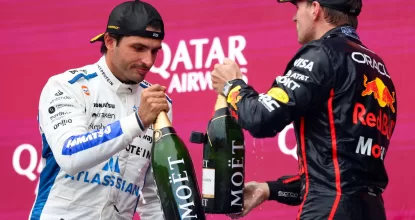 BAKU, AZERBAIJAN - SEPTEMBER 21: Race winner Max Verstappen of the Netherlands and Oracle Red Bull Racing and Third placed Carlos Sainz of Spain and Williams celebrate on the podium with Champagne during the F1 Grand Prix of Azerbaijan at Baku City Circuit on September 21, 2025 in Baku, Azerbaijan. (Photo by Andy Hone/LAT Images) // Getty Images / Red Bull Content Pool // SI202509210508 // Usage for editorial use only //